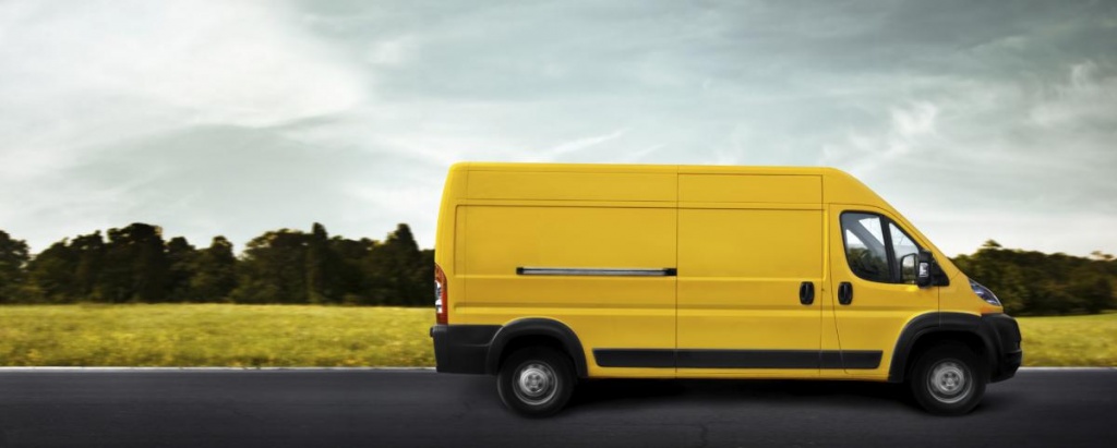 courier_on_the_road_in_yellow_freight_van.jpg